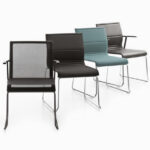 ICF Skid Base With Armrests Upholstered Conference Chair angled view