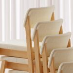 Kusch + Co Embla Frame Chair 4L HB Uph 4-Leg Upholstered High Frame Chair upholstered high-back four-leg chair arrangement