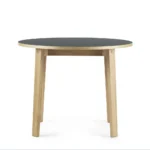 Normann Copenhagen Slice N-SL Round Table product view of the Slice round table in oak