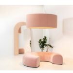 BuzziSpace Medium Wall-Mounted Sound-Absorbing Felt Acoustic Mirror BuzziMirage acoustic mirror in a room with BuzziCee and BuzziJet