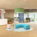 BuzziSpace Acoustic Upholstered C-Shaped Bench lifestyle view